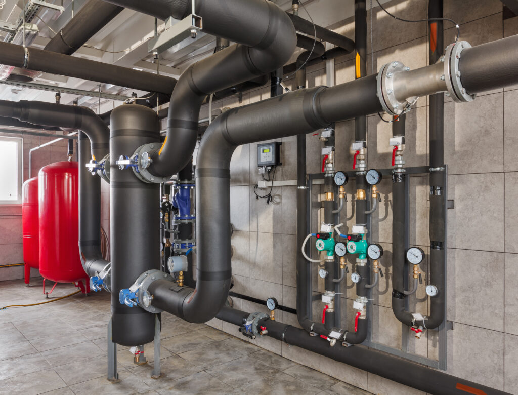 stock-photo-interior-of-industrial-gas-boiler-room-with-boilers-pumps-sensors-and-a-variety-of-pipelines-1278903904