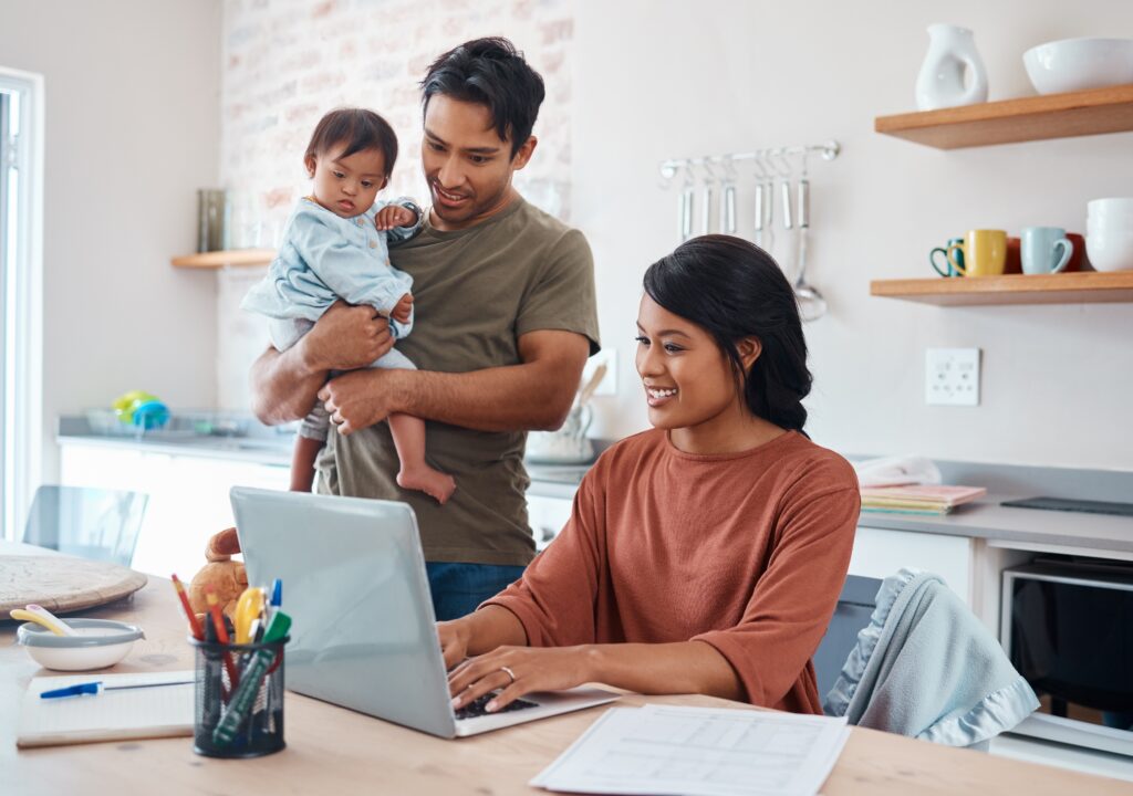 stock-photo-internet-family-and-parents-doing-research-on-down-syndrome-with-baby-on-a-laptop-in-their-house-2210718881