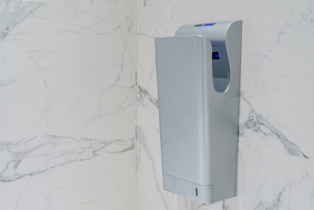 stock-photo-modern-vertical-hand-dryer-in-public-restroom-wc-754321924