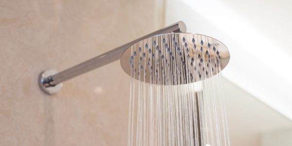 stock-photo-shower-turned-on-overhead-ceiling-shower-faucet-head-closeup-1417551221