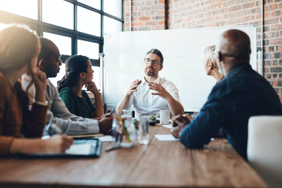 stock-photo-man-manager-and-meeting-or-presentation-in-boardroom-with-coworkers-for-corporate-business-seminar-2473319593