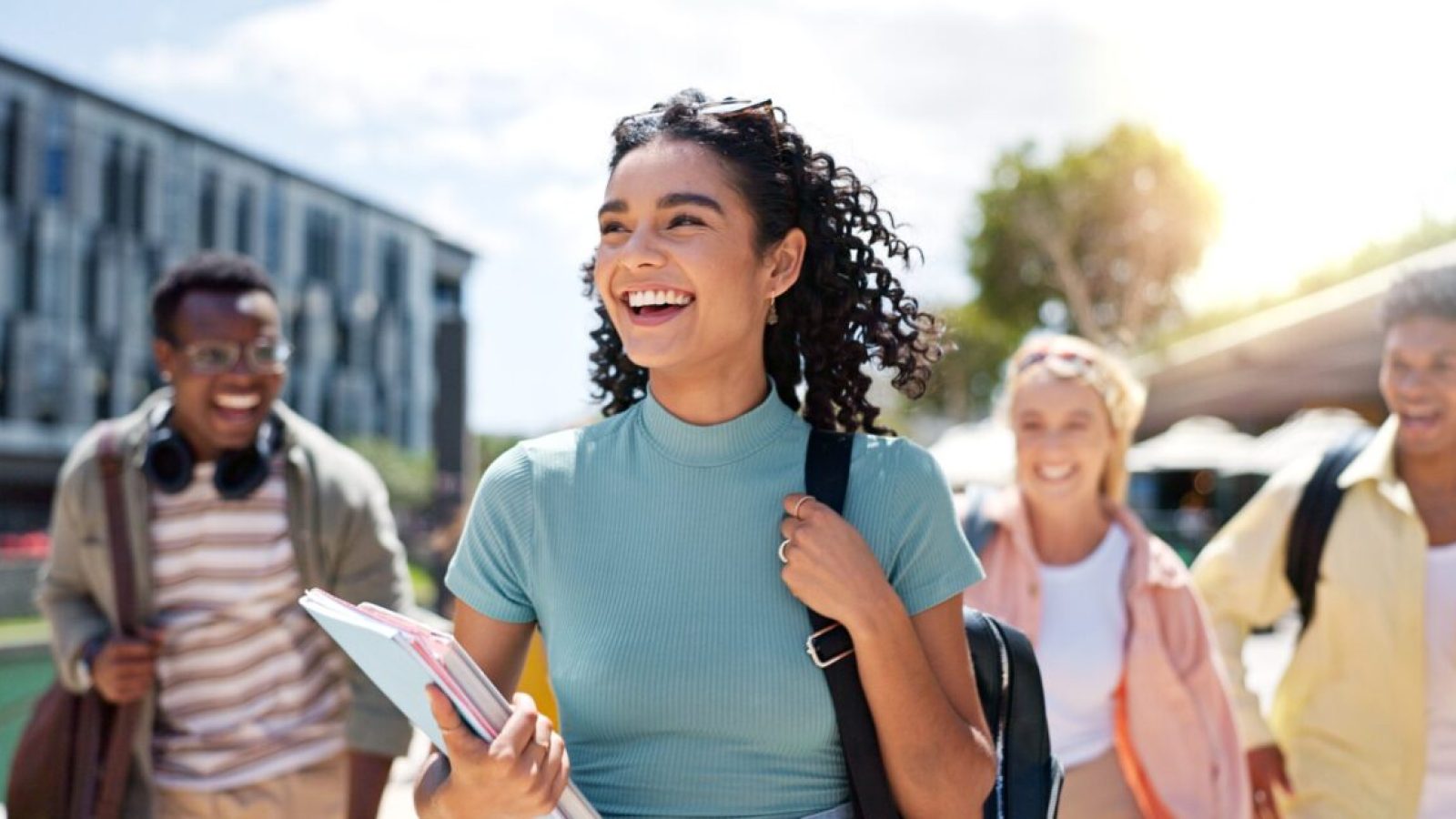 stock-photo-walking-happy-and-girl-with-friends-at-university-for-learning-bonding-and-talking-with-fun-2477767447