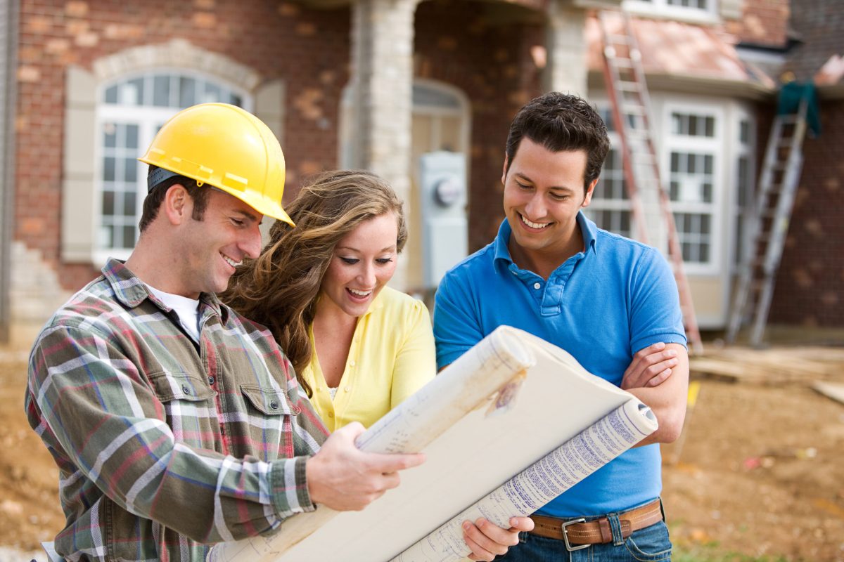 stock-photo-construction-young-couple-look-at-home-plans-with-builder-170475800 stock-photo-construction-young-couple-look-at-home-plans-with-builder-170475800